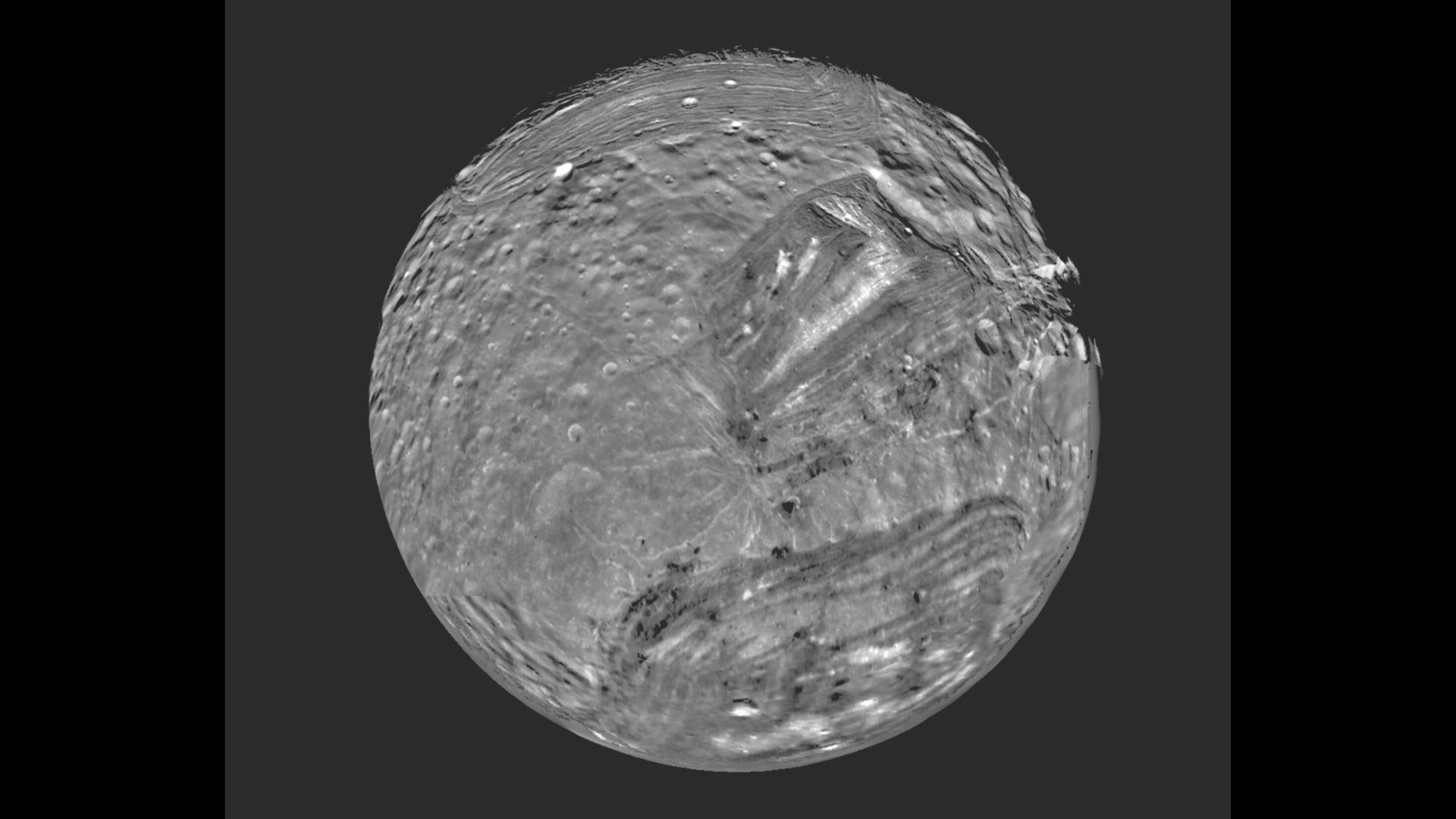 Voyager 2's 1986 image of Miranda, a moon of Uranus named after Shakespeare's daughter Prospero "storm."