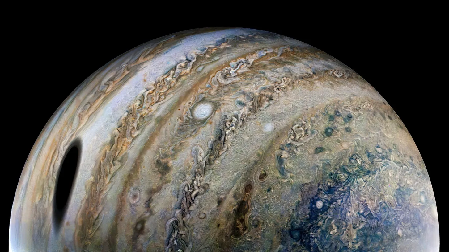 Juno captures the moon's shadow on Jupiter