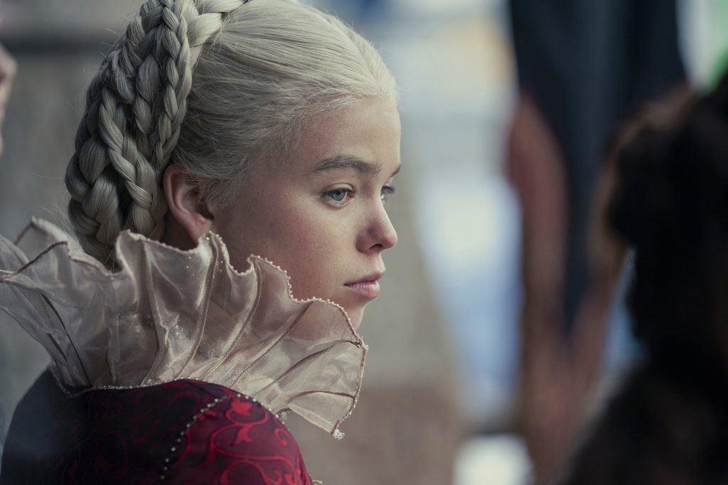 Millie Alcock in a side view in a ruffled collar as Princess Rhinera Targaryen "Dragon House."