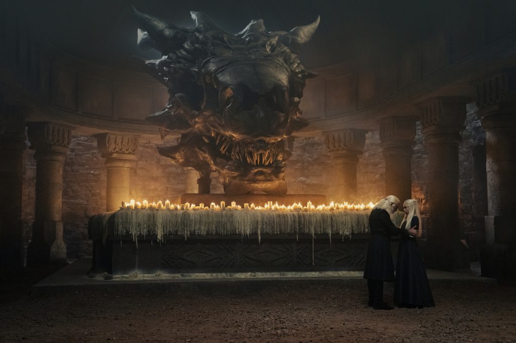 King Viserys (Paddy Considine) and his daughter Princess Rhaenyra Targaryen spoke in front of a dragon skull after he named it his heir. 