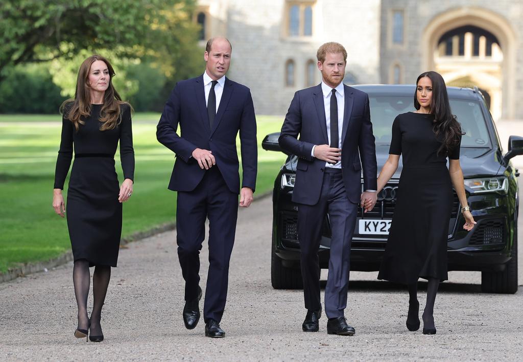 The Prince and Princess of Wales with the Duke and Duchess of Sussex greet wellness workers outside Windsor Castle
