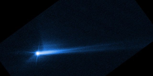 These images from NASA's Hubble Space Telescope on October 8, 2022 show debris exploding from the surface of Demorphos 285 hours after the asteroid deliberately collided with NASA's Dart spacecraft on September 26. 