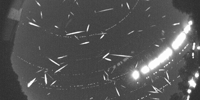 More than 100 meteors are recorded in this composite image taken during the peak of the Geminid meteor shower in 2014. 