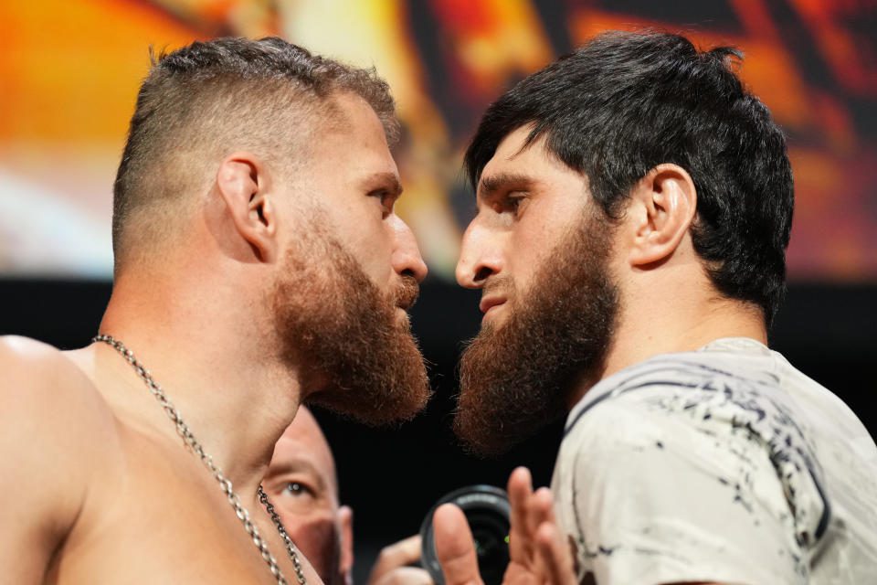 LAS VEGAS, NV - DECEMBER 9: (LR) Opponents Jan Blachowicz of Poland and Magomed Ankalev of Russia face off during the UFC 282 ceremonial banquet at MGM Grand Garden Arena on December 09, 2022 in Las Vegas, Nevada.  (Photo by Chris Unger/Zoffa LLC.